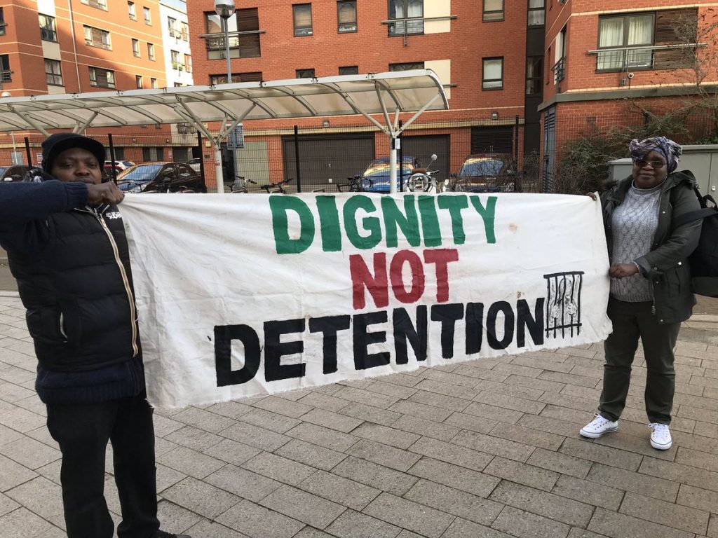 dignity not detention banner